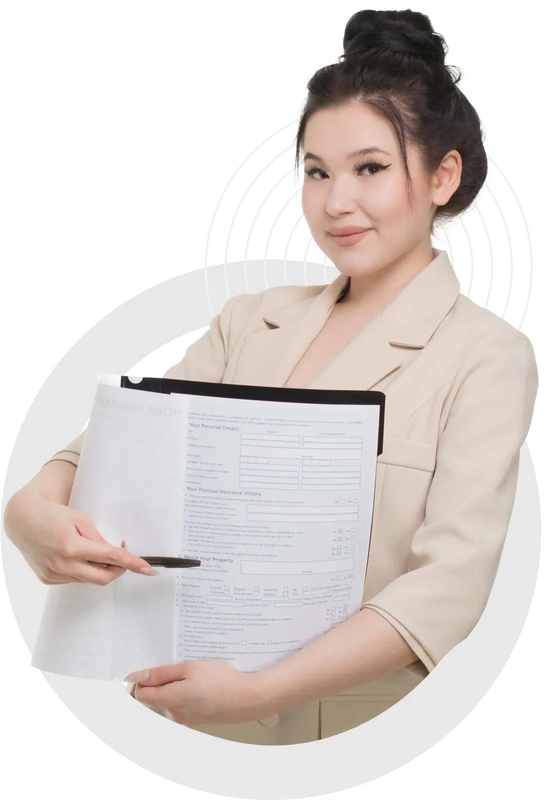 An image of a lady real estate agent holding a pen pointed to a section of a form.